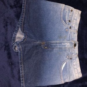 Women’s jean shorts, ombré light to dark wash.